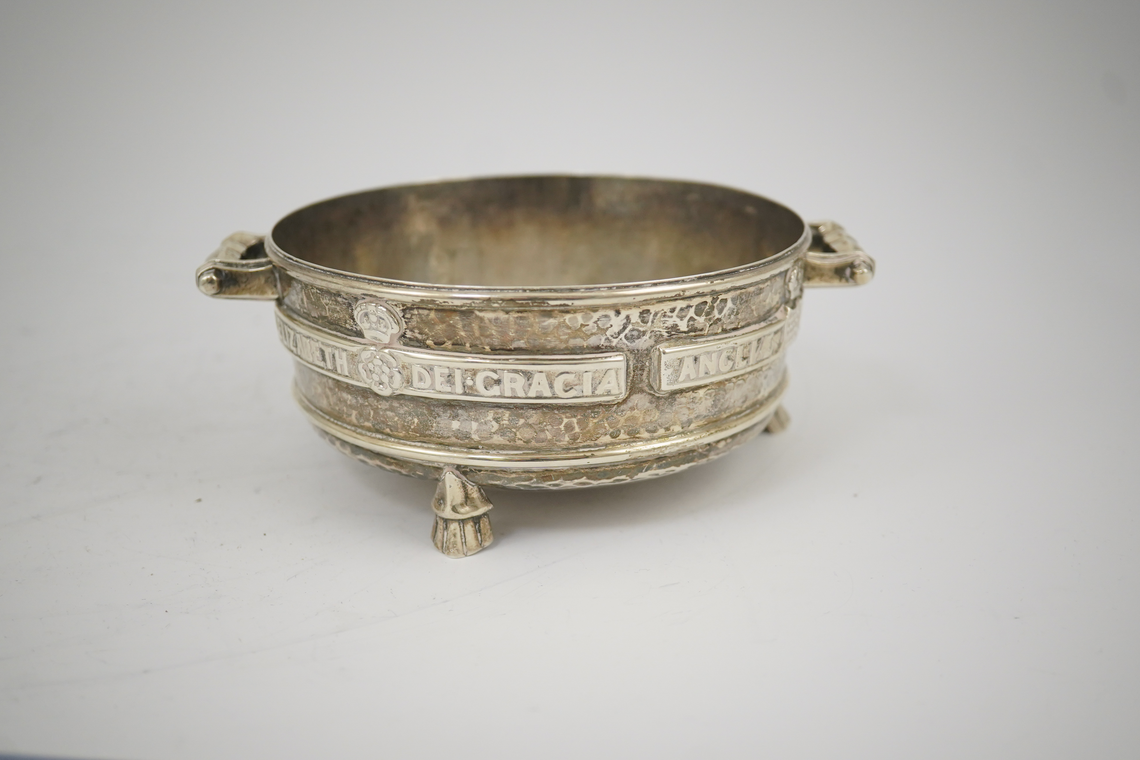 A George V Arts & Crafts planished silver replica of a late 15th century Winchester Bushel measure, by Albert Edward Jones